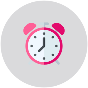 A pink alarm clock sits on a grey background