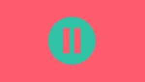 A turquoise pause button sits on a bright pink background to symbolise that in the IELTS speaking exam you should try to paraphrase rather than pause.