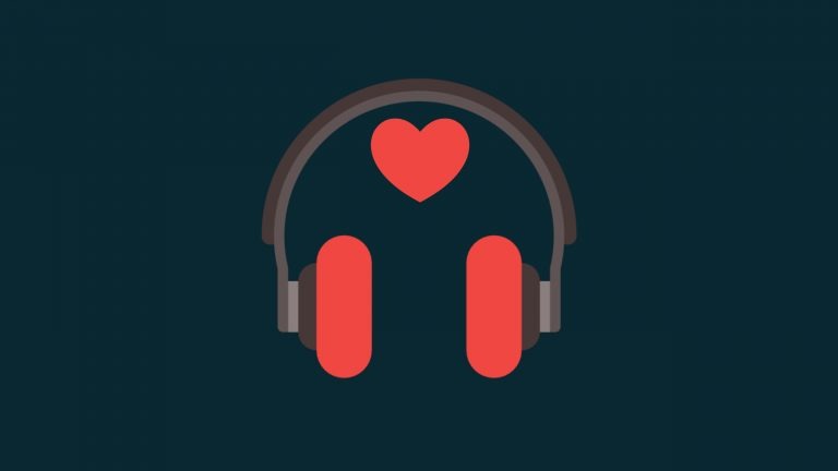 A pair of headphones with red earphones sit on a dark grey background with a heart floating above to show I love to use podcasts to help IELTS students